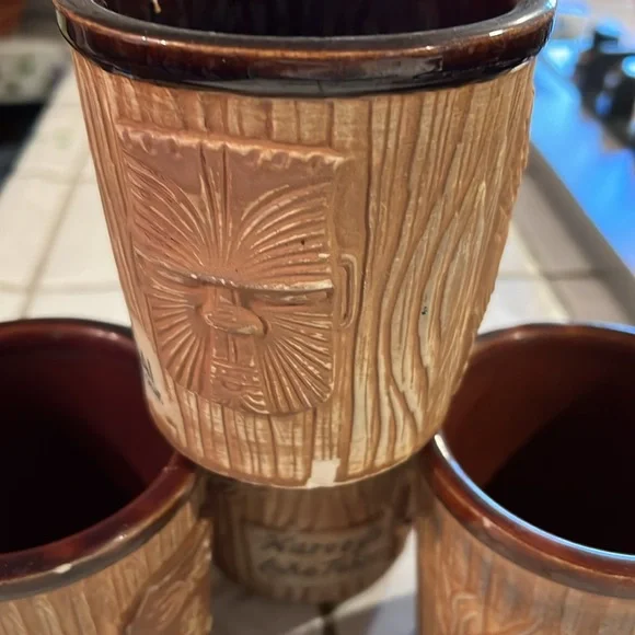 Tiki ceramic mugs vintage set of 4. Some small chips